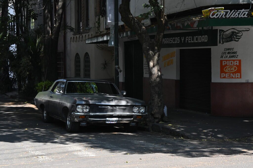 Volcano and lava field against a stormy sky